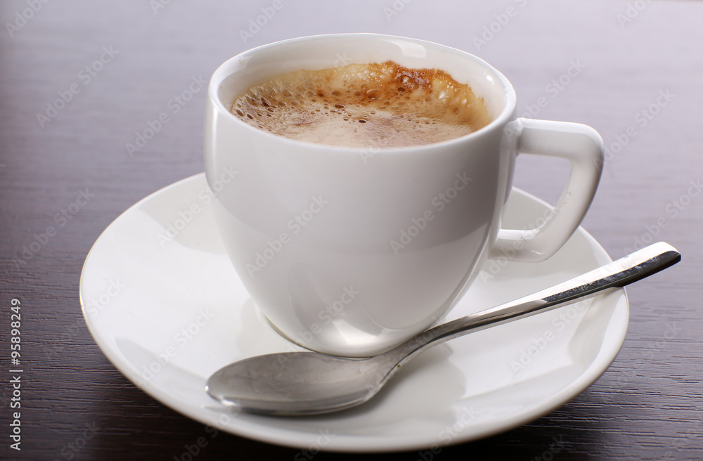 Cup of coffee on table close up Cup of coffee on table close up