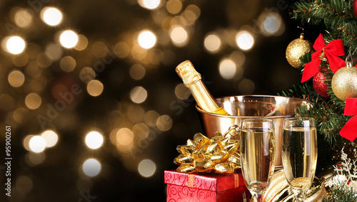Christmas or New Year's Eve. Champagne and Presents over Black 