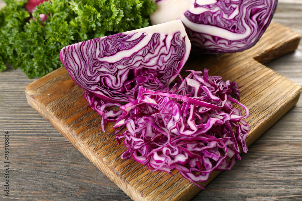 Red cabbage and parsley on wooden table Red cabbage and parsley on wooden table