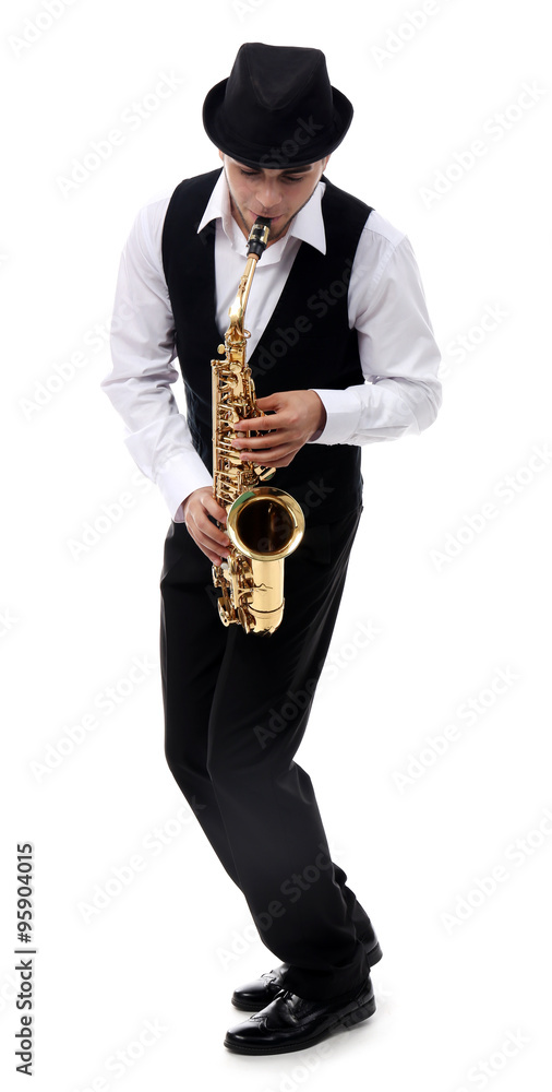Fototapeta premium Happy saxophonist plays music on sax in elegant suit on white background