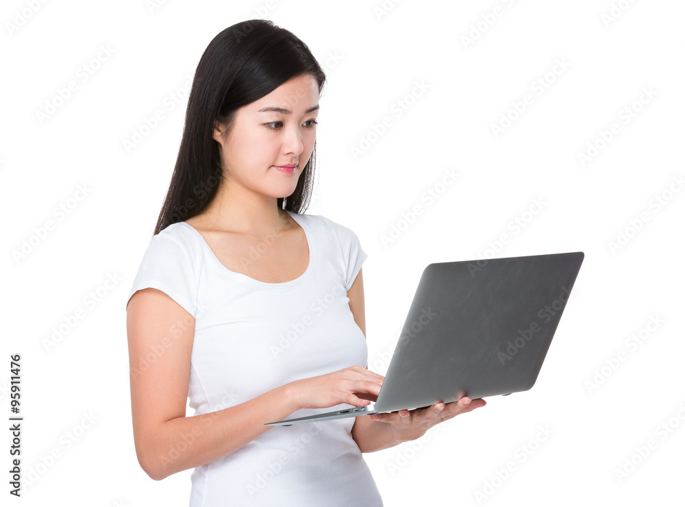 Woman working with the notebook computer