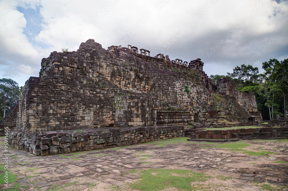 Reclining Buddha face in Baphuon temple, Angkor Thom city Reclining Buddha face in Baphuon temple, Angkor Thom city