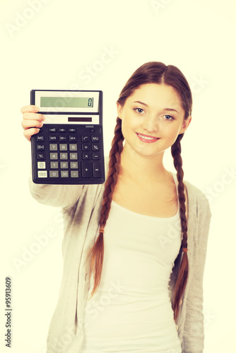 Young woman hold digital calculator. 