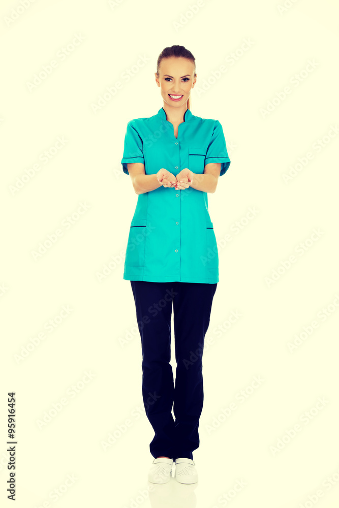 Fototapeta premium Doctor woman hand showing something on palms.