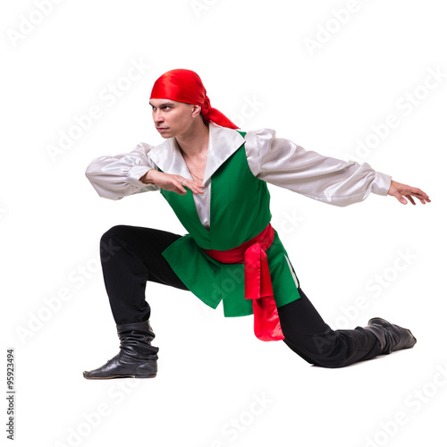 Dancing man wearing a pirate costume. Isolated on white in full length © StepStock