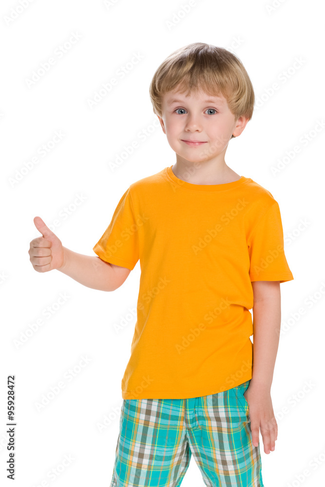 Cute little boy holds his thumb up Cute little boy holds his thumb up