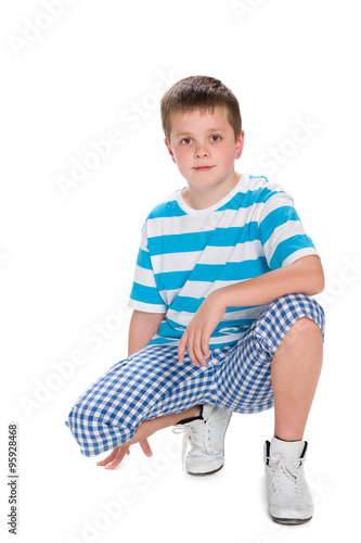 Cute boy in a blue striped shirt