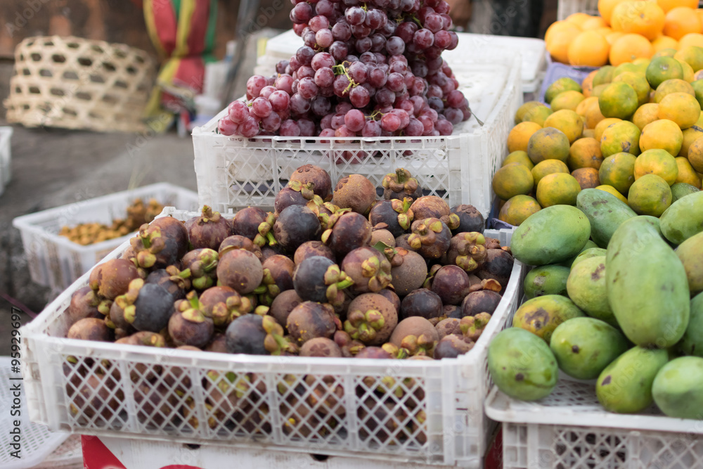 tropical fruits at market in bali / fruits shop tropical fruits at market in bali / fruits shop