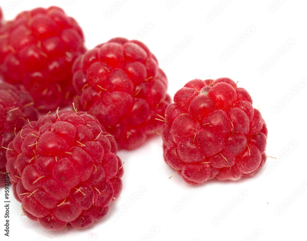 Fresh ripe raspberries on a white background Fresh ripe raspberries on a white background