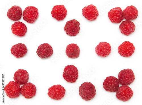 ripe raspberries on a white background