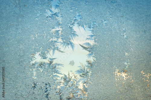 Frosty icy pattern on window 