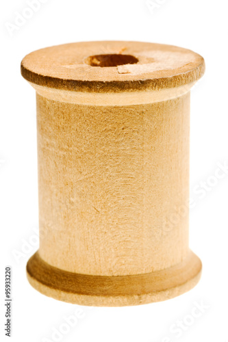 antique empty thread spool isolated
