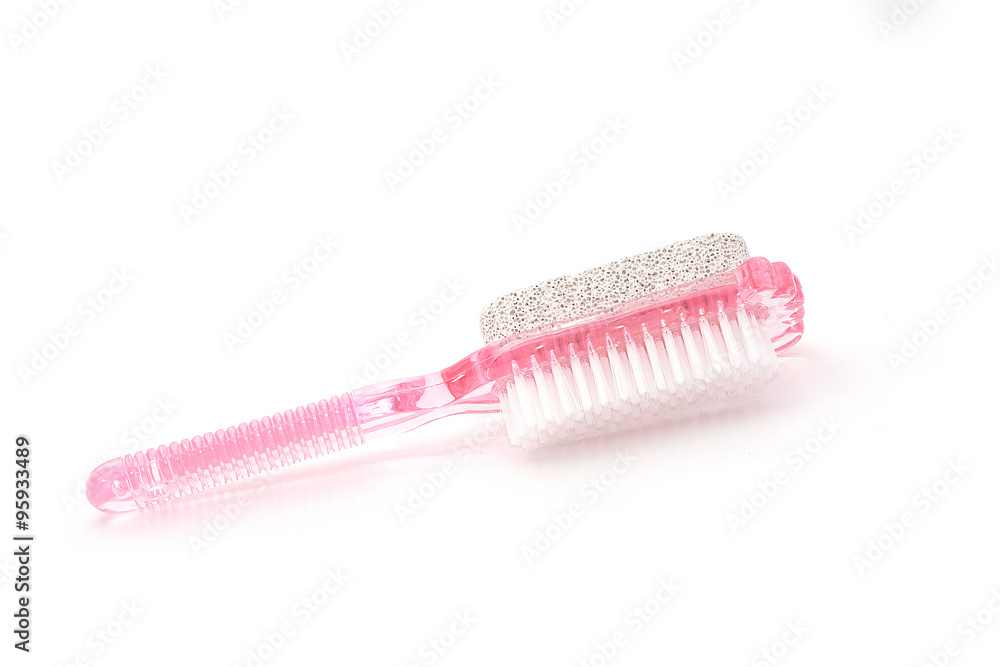 Brush and pumice stone for foot care isolated on white backgroun Brush and pumice stone for foot care isolated on white backgroun