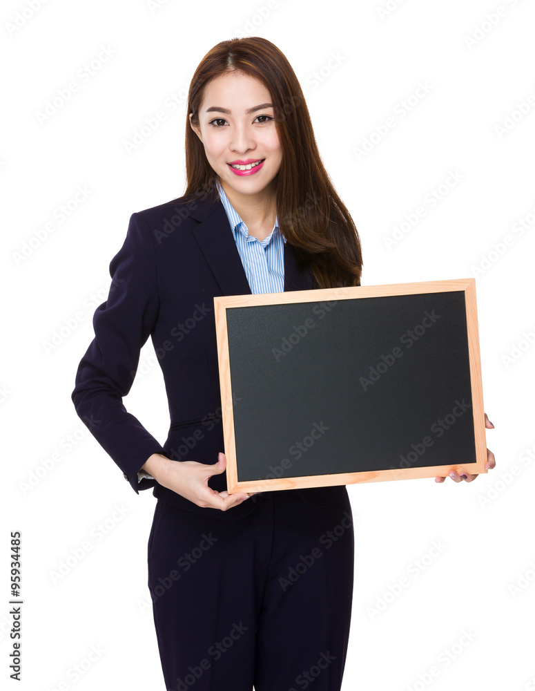 Businesswoman showing with the chalkboard Businesswoman showing with the chalkboard