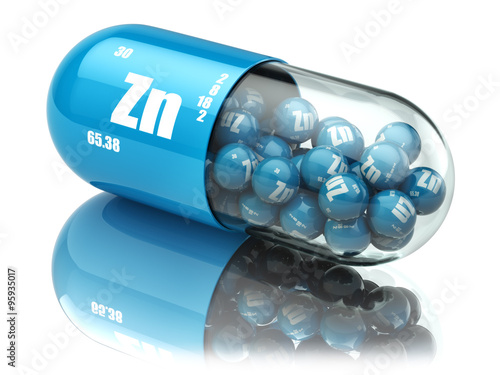 Pills with zinc Zn element Dietary supplements. Vitamin capsules photo