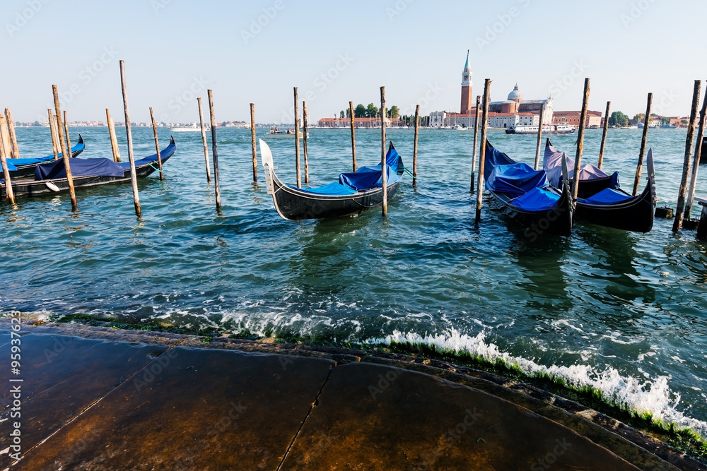 Gondolas in lagoon of Venice, Italy.