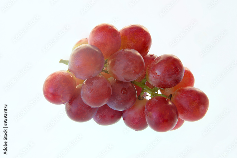 Red grape isolated on white.