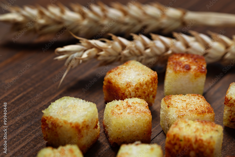 Fried bread cut into cubes for cooking. Fried bread cut into cubes for cooking.
