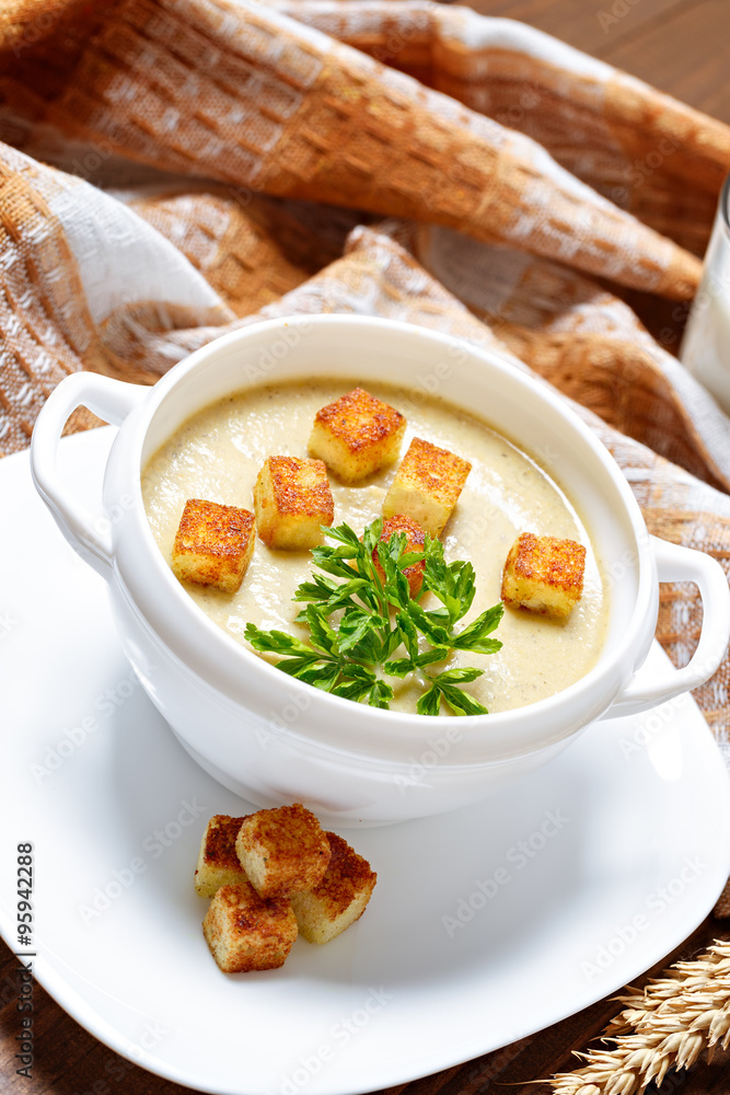 Vegetable soup with pieces of toasted bread and parsley. Vegetable soup with pieces of toasted bread and parsley.