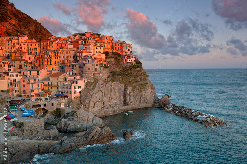 Picturesque view of Manarola, Laguria, Italy on a sunset