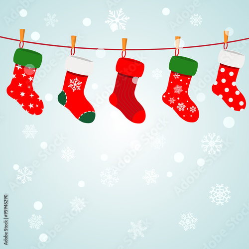 Christmas background with socks hanging on a rope