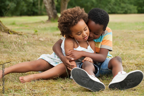Canvastavla Big brother is caring of his sister