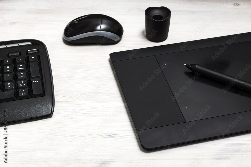 Home based business concept. Close-up of modern graphic artist workspace. Home based business concept. Close-up of modern graphic artist workspace.