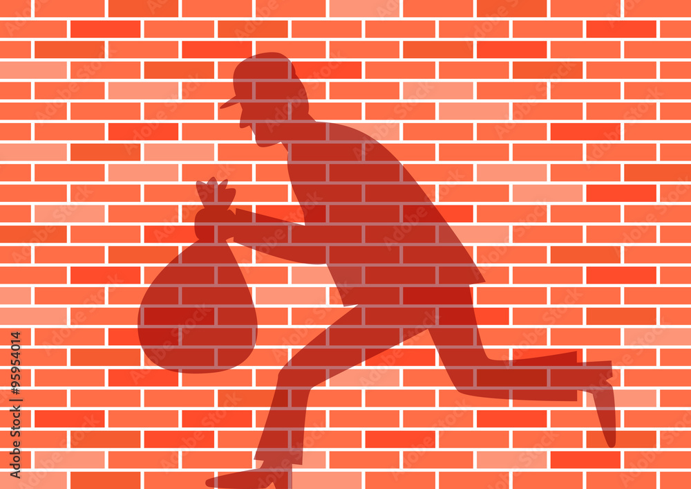 Thief shadow on brick wall Adobe Stock