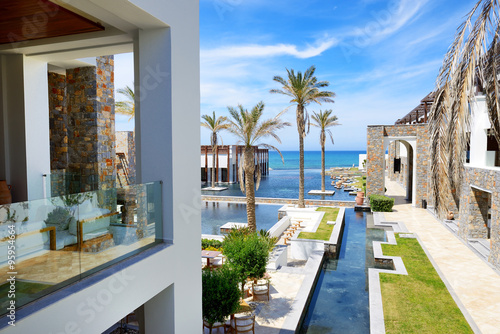 The pools and beach at luxury hotel, Crete, Greece © slava296