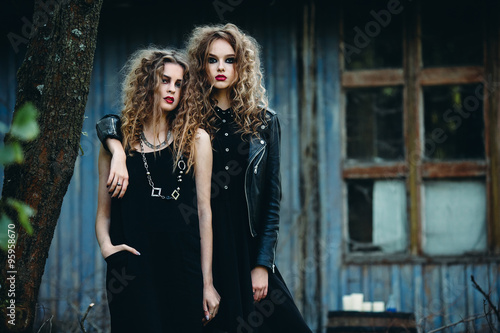 two vintage women as witches