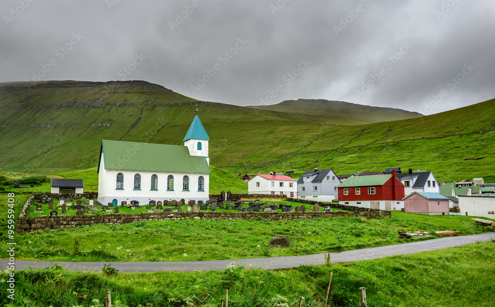 Small village church with cemetery in Gjogv, Faroe Islands, Denmark