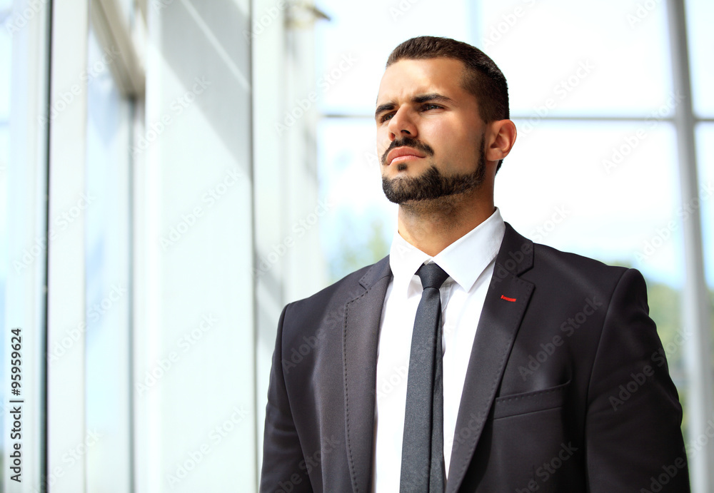 Handsome smiling confident businessman portrait Handsome smiling confident businessman portrait
