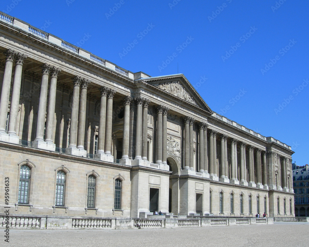 Architectural details of entry and interior court of the Louvre Museum in Paris, France