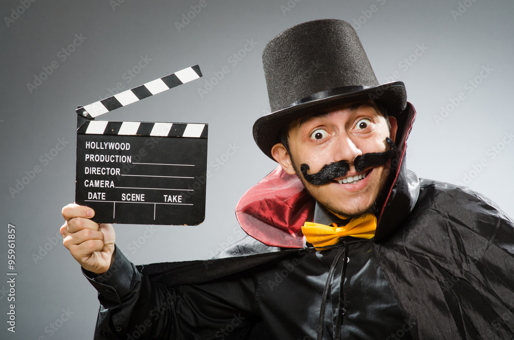 Funny man with movie clapboard Funny man with movie clapboard