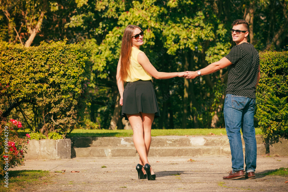 Obraz premium Walking couple back view
