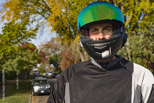 Motorcyclist Portrait Helmet On Visor Up © CascadeCreatives