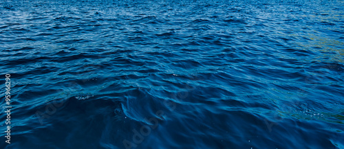 close up blue water surface at deep ocean