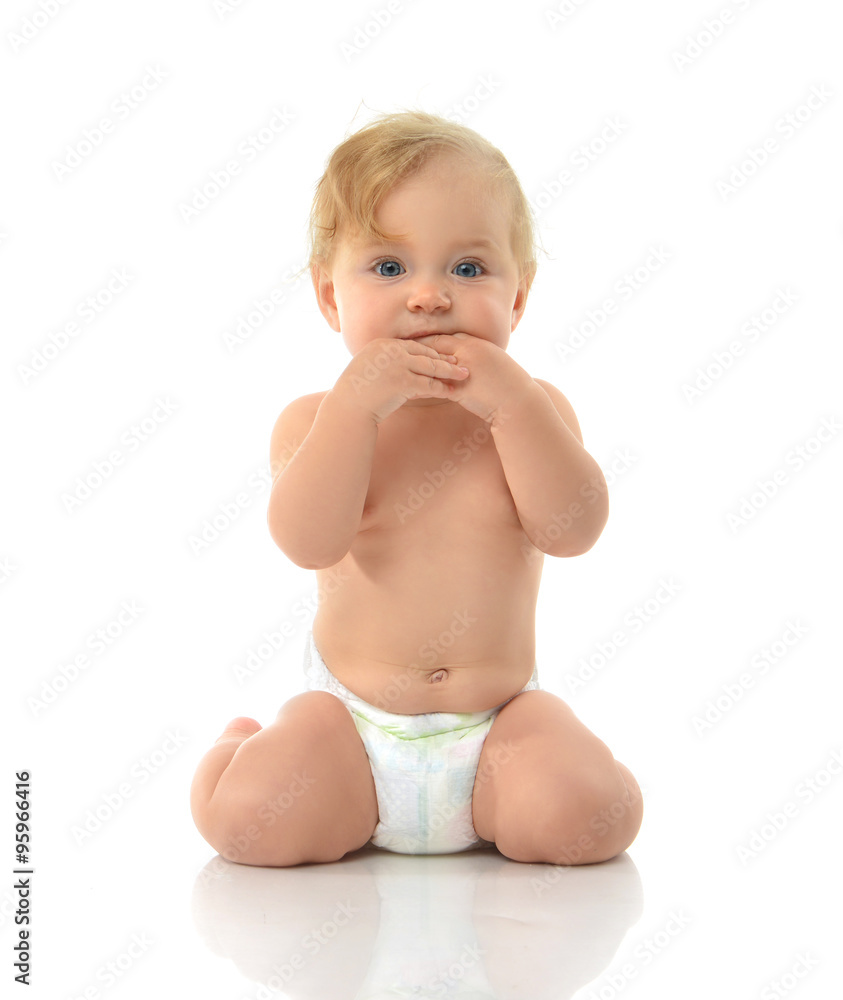Infant child baby girl in diaper sitting happy looking at the ca Infant child baby girl in diaper sitting happy looking at the ca