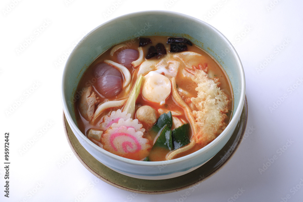 Tom Yum seafood udon isolated on white background. Thai style sp Tom Yum seafood udon isolated on white background. Thai style sp