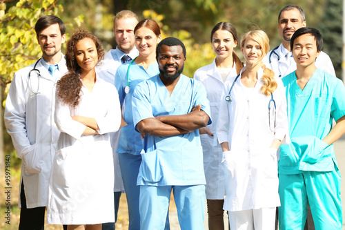 Smiling medics team, outdoors