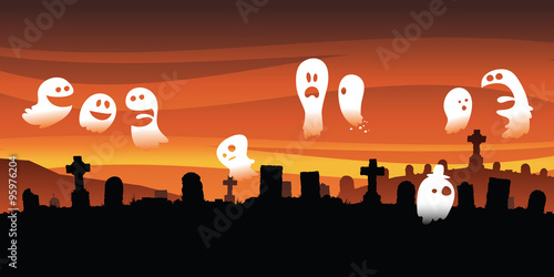 A group of funny, friendly cartoon ghosts hover above the silhouette of a graveyard.