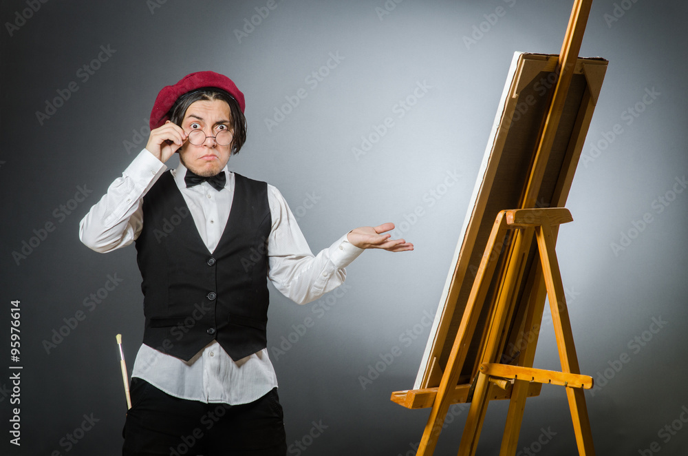 Funny artist in dark studio Funny artist in dark studio