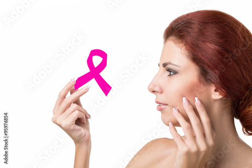 Woman with pink ribbon symbol female health