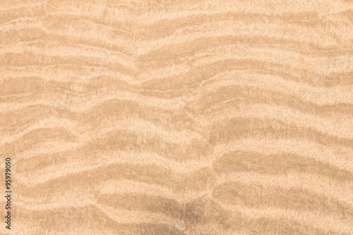 close up surface beach sand packed curve background