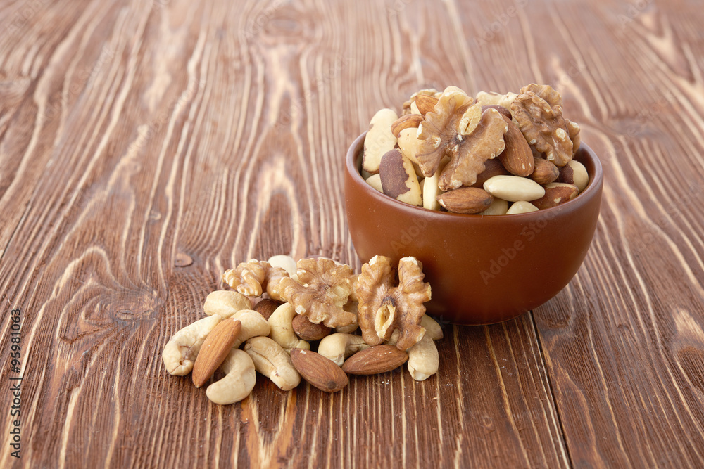 Mix nuts  on wooden background