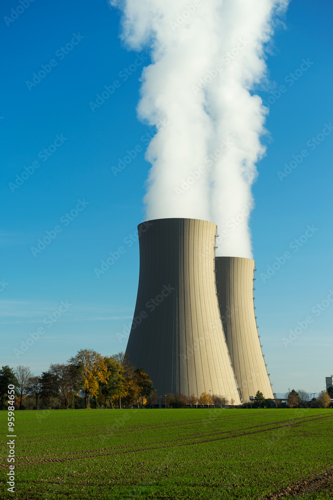 Nuclear power plant on the sky background in sunlight Nuclear power plant on the sky background in sunlight