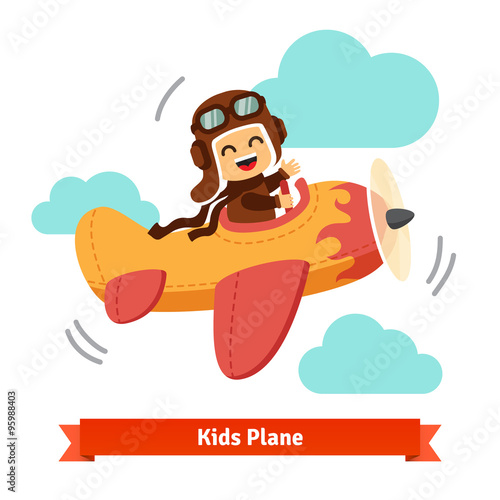 Happy smiling kid flying plane like a real pilot