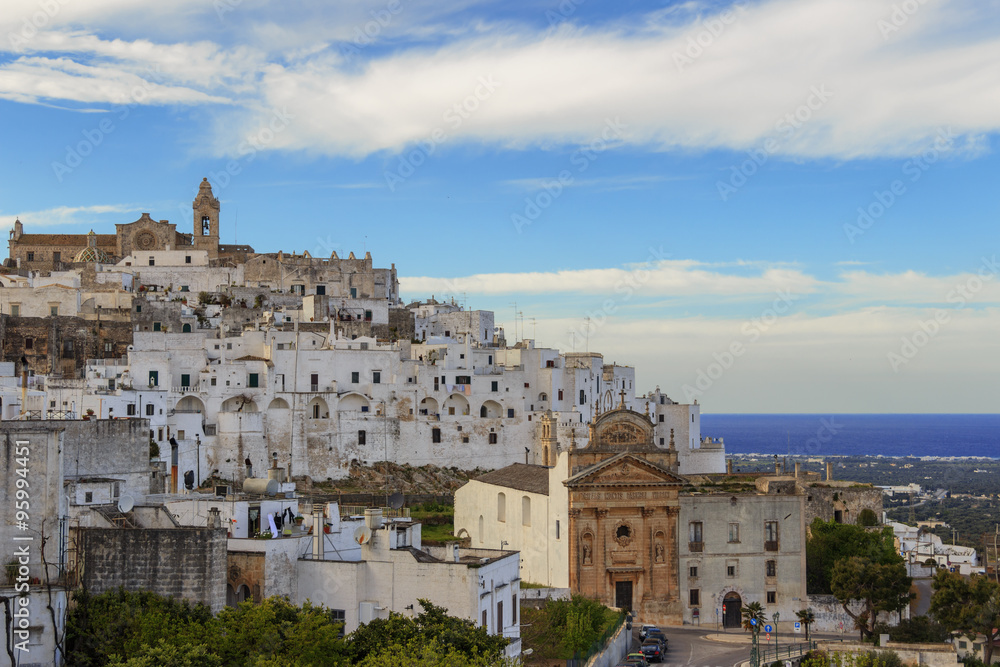 Ostuni,the withe city.Panoramic view:on background the Romanesque-Gothic Cathedral.-ITALY(Apulia)- Ostuni,the withe city.Panoramic view:on background the Romanesque-Gothic Cathedral.-ITALY(Apulia)-