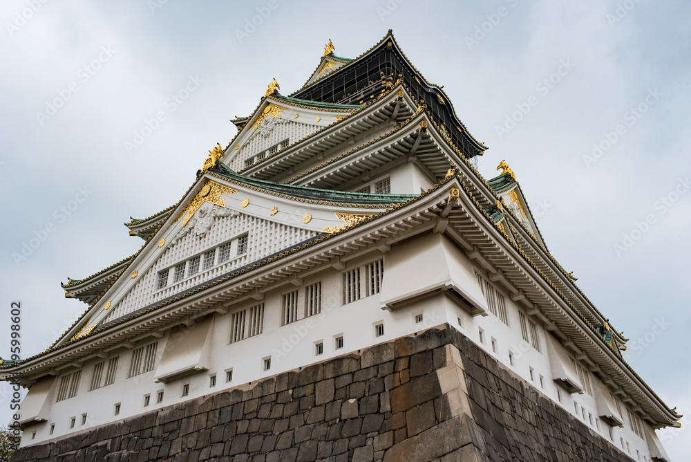 Osaka castle in cloudy sky before the rain fall down in Osaka, Japan. Osaka castle in cloudy sky before the rain fall down in Osaka, Japan.
