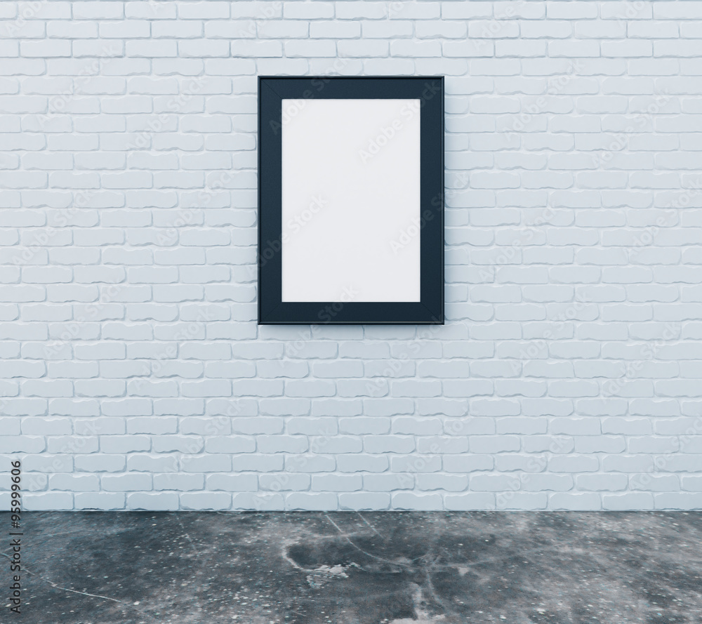 Blank picture frame on brick wall with concrete floor in empty r Blank picture frame on brick wall with concrete floor in empty r
